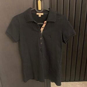 Burberry (Brit line) Polo Shirt. True size small. Short sleeves